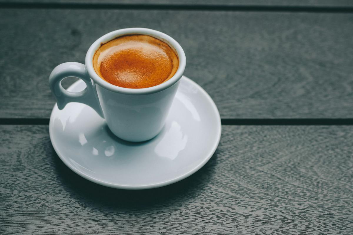 Italian macchiato coffee in Italy mug and saucer