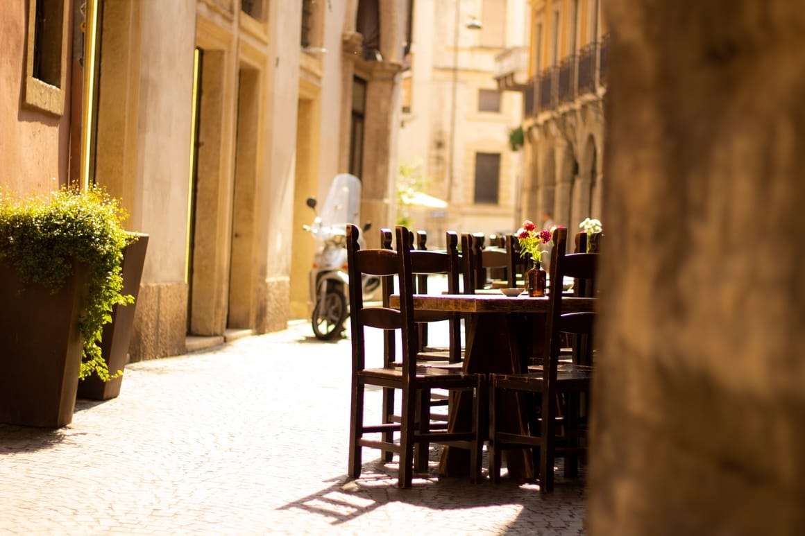 A chair at a cafe table in Briancon in France.Unique travel destinations