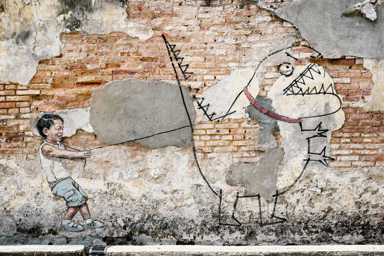 Photos that will make you want to visit Malaysia's Food Capital, George Town in Penang, Malaysia | Street art boy wit pet dinosaur